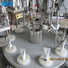 Macchina automatica di riempimento e sigillamento di tubi di tubi di plastica rotanti